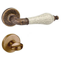 Дверна ручка на розетці DND by Martinelli MONICA антична обробка/бежевий фарфор (з накладкою під