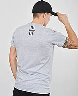 Чоловіча футболка з накаткою на грудях і спині Puma світлий сірий меланж