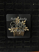 Гребінець золотистий для волосся із сірими кристалами квіточок із пелюстками розмір 8х7 см