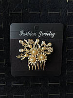 Гребінець золотистий для волосся з золотистими намистинами та кристалами квіточки з пелюстками розмір 7х5 см