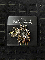 Гребінець золотистий для волосся із сірими кристалами квіточок із пелюстками розмір 7х6 см