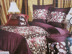 Атласний постільний комплект на двоспальне ліжко