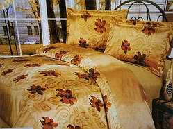 Атласна постільна білизна золотиста з квітковим принтом