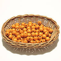 Дерев'яні намистини 13мм (100шт в упаковці) помаранчевого кольору