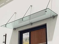 Скляний козирок з нержавіючої сталі над входом.