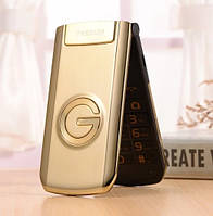Телефон кнопковий розкладачка з батареєю великої ємності і камерою на 2 sim Tkexun G3 gold