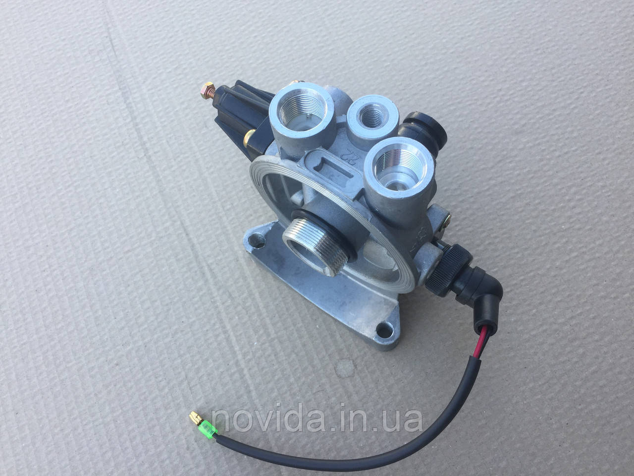 Кран влагоотделителя 4-виходу MB, MAN, IVECO, DAF (основа осушувача) 44180082