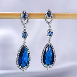 Довгі вечірні сережки з камінням