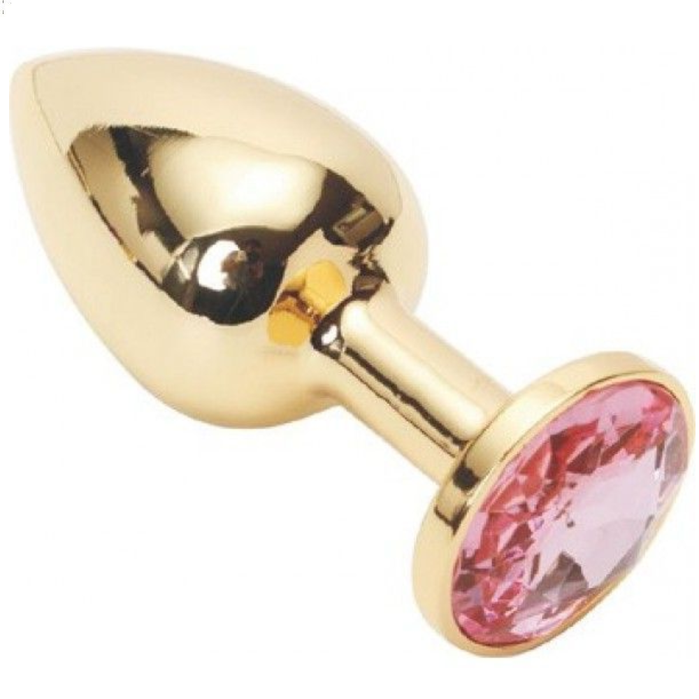 Золота анальна пробка з рожевим кристалом середнього розміру.