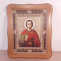 Икона Пантелеймон святой великомученик и целитель, лик 15х18 см, в светлом деревянном киоте с камнями