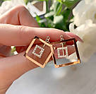 Срібний набір жіночих прикрас сережки і каблучка з золотом та фіанітами Rihanna, фото 2