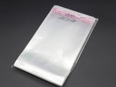 Поліпропіленова упаковка прозора з липкою стрічкою 20х11см 25мкм 100шт/уп у закритому вигляді - 15,5х11см