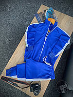 Спортивний костюм з кофтою на блискавці синього кольору (штани, завужені до низу, приталений фасон, весна/літо)