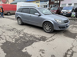 Дефлектори вікон (вітровики) OPEL ASTRA 5d 2004r combi →(HEKO)