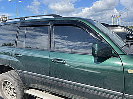 Дефлектори вікон (вітровики) клейкі Toyota LC 100 / LX470 Euro 1998 -> 4D 4 шт (ANV-AIR)