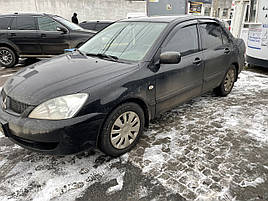 Дефлектори вікон (вітровики) клейкі/накладні Д/о Mitsubishi Lancer 9 2003-2007 Sedan 4 шт (ANV-AIR)