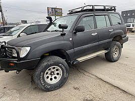 Дефлектори вікон (вітровики) клейкі/накладні Toyota LC 100 / LX470 Euro 1998 -> 4D 4 шт (ANV-AIR)