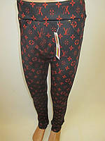 Дитячі лосини чорного кольору з малюнком.