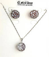 Набір: кулон на ланцюжку, сережки. Родій. Камені: білий циркон.