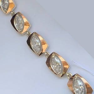 Срібні браслети зі золотими накладками