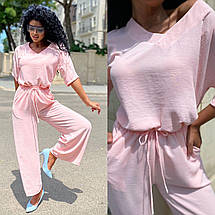 Трендовий жіночий костюм цього літа блуза та штани палаццо з жниварки розміри норма та батал, фото 2