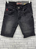 Мужские потертые черные джинсовые шорты по коленко