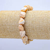 Браслет на гумці натуральний беж. Перламутр галтівка d-19х12мм+-L-18см+- купити біжутерію дешево оптом в інтернеті