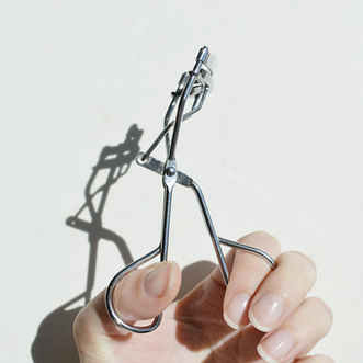 Щипці для підкручування вій