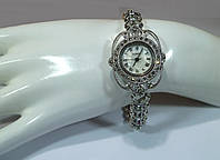 Серебряные часы с натуральными марказитами, рубинами, изумрудами, сапфирами и белым перламутром