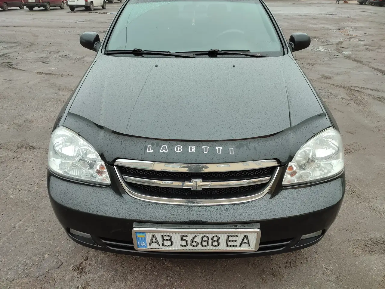 Дефлектор капота на Chevrolet Lacetti седан/універсал 2004-2013. Мухобійка на Chevrolet Lacetti