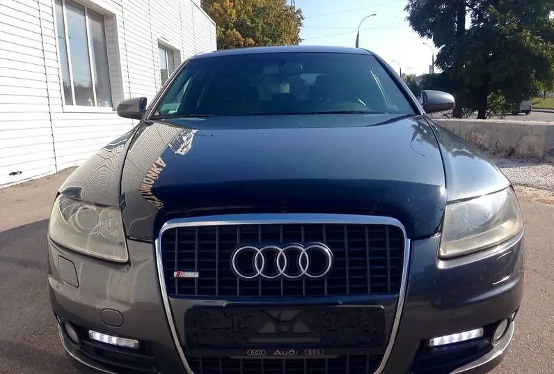 Дефлектор капота на Audi A6 2005-2011. Мухобійка на Audi A6