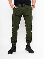 Мужские оливковые темно зеленые джинсы джогеры на резинке