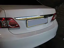 Накладка над номером 2010-2013 (нерж) для Toyota Corolla рр