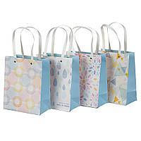 Паперові подарункові пакети