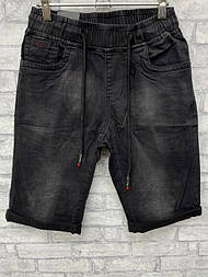 Чоловічі потерті чорні джинсові шорти на гумці напівбатал 30-го розміру