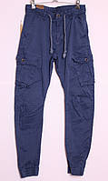 Мужские молодежные джинсы на манжете с накладными карманами( 1870) по бокам (32.33,34,36р.)