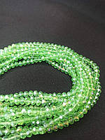 Хрустальные бусины (рондель) 6*4 мм, пачка 88-94шт. цвет - зеленый с переливом