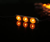Модуль світлодіодний 0.72вт 12вольт з лінзою 160º три світлодіода SMD2835 кластер для реклами оранжевий amber