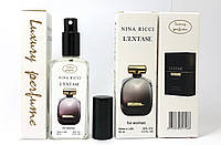 Тестер женский Nina Ricci L Extase (Нина Ричи Экстаз) 65 мл