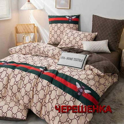 Тканина для постільної білизни Бязь "Gold" Lux GL1817 (A+B) - (50м+50м) бежева і коричнева з брендовим принтом, фото 1