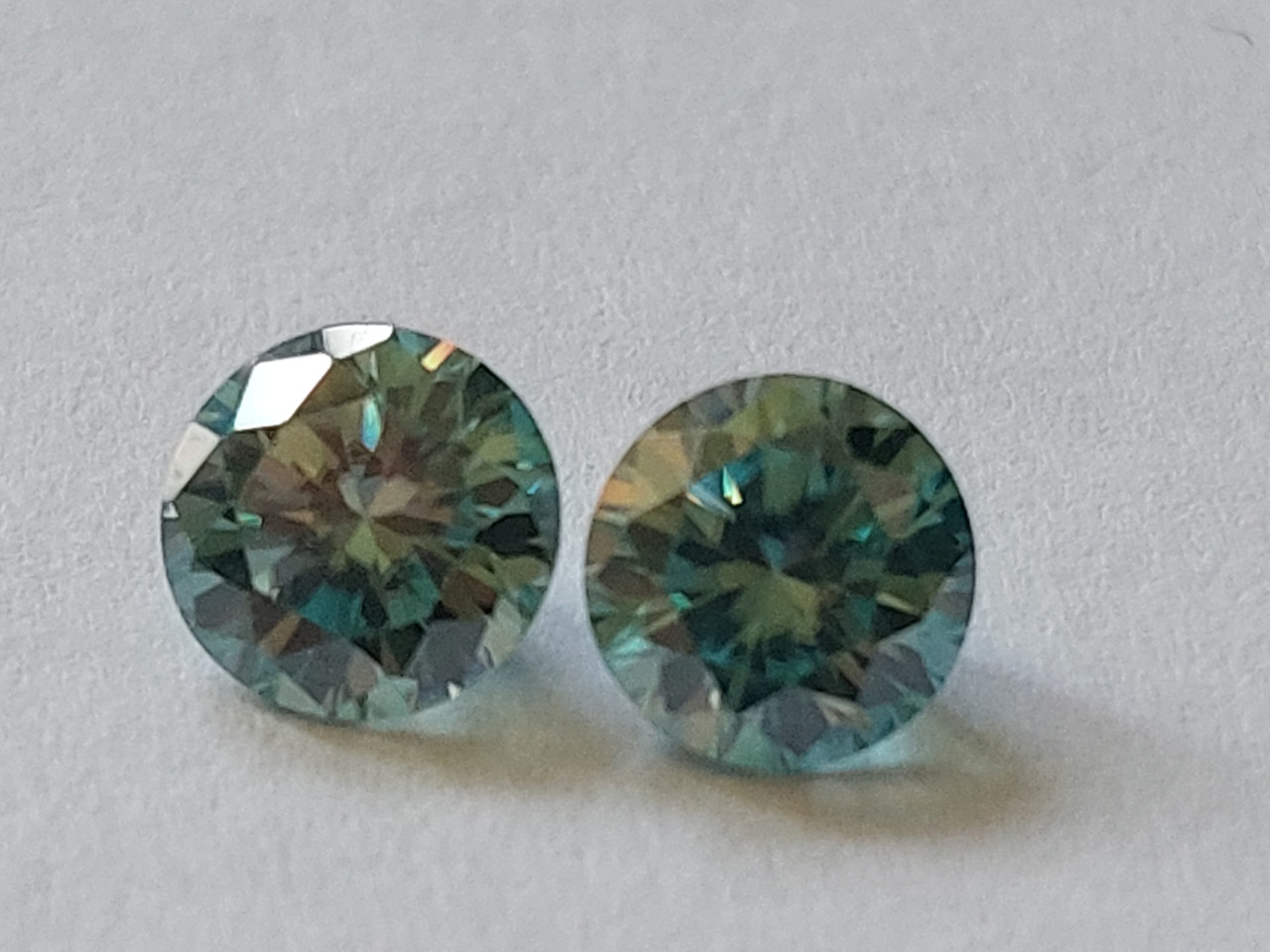 Муасаніт пара 1.20ct VVS1 2 х 5.60 mm кожний