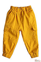 Штани джогери яскраво-жовтого кольору для маленького хлопчика (74 см). NK Unsea