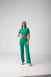 Костюм жіночий літній трикотаж рубчик зеленого кольору топ та штани розмір 42-46