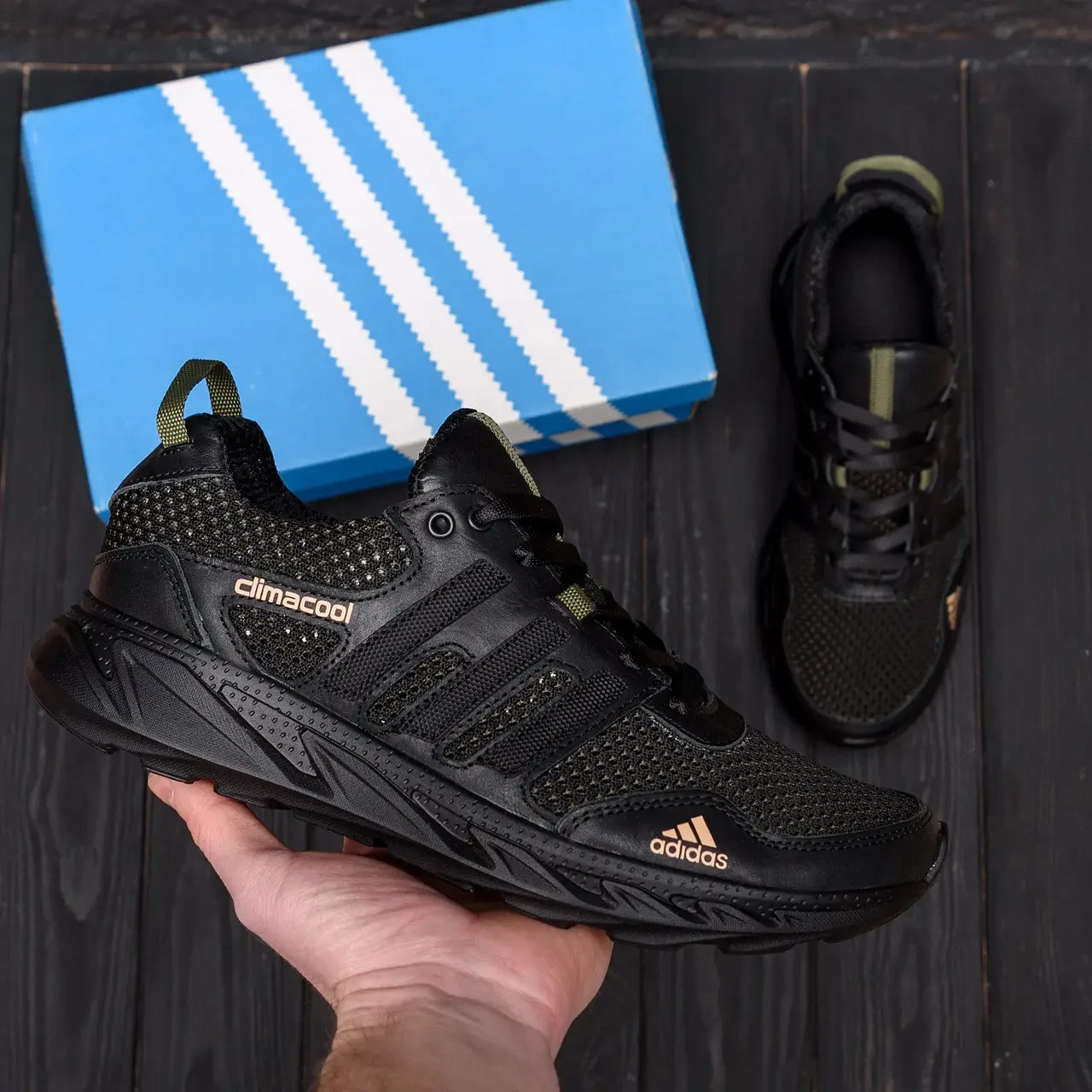 Чорні шкіряні кросівки з перфорацією на літо