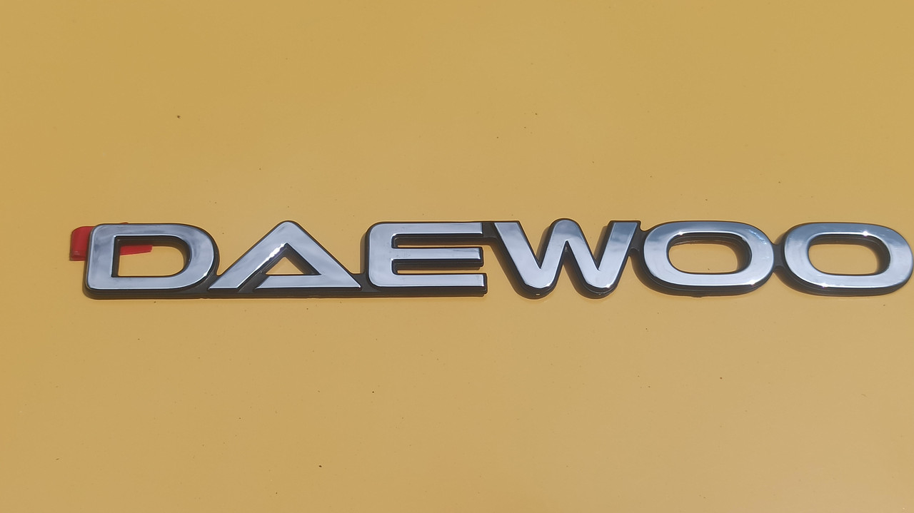 Напис (емблема) DAEWOO на кришку багажника Нубіра GM 96190445