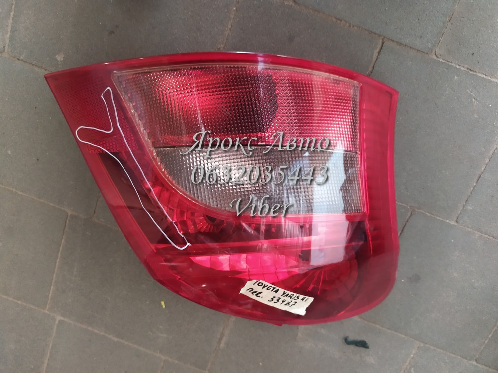 Ліхтар задній лівий Toyota Yaris P1 2004 000033487, фото 1