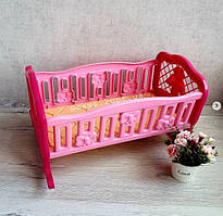 Іграшка Колиска ТехноК 4531 Ліжечко для ляльки рожеве дитяче пластикове