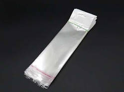 Поліпопіленові пакети з європідвісом. 16,5х7см +клапан. 25мкр. 100шт/уп. / Поліпопіленові пакети з європідвісом. 16,5х7см +клапан.