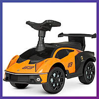 Детская каталка-толокар Lamborghini 660-7 световые и звуковые эффекты оранжевая