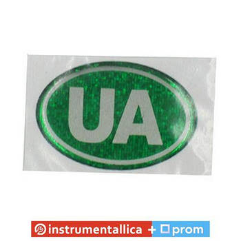 Емблема силіконова UA зеленувато-біла 5 см х 3 см
